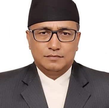 Mr. Madan Kumar Dangol